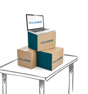 mesa y cajas de cartón rajabox